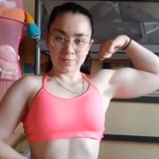 16 years old Fitness girl Viktoria Flexing muscles