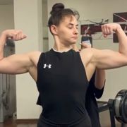 17 years old Armwrestler Nastasia Flexing biceps