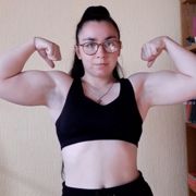 18 years old Fitness girl Viktoria Flexing muscles