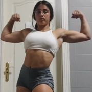 16 years old Fitness girl Cris Flexing muscles