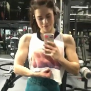18 years old Fitness girl Beatriz Flexing muscles