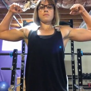 17 years old Fitness girl Delaney Flexing biceps