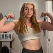 16 years old Powerlifter Abigail Flexing biceps