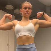 15 years old Fitness girl Moa Flexing muscles