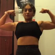 17 years old Powerlifter Emily Flexing muscles